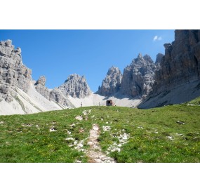 The Perugini Bivouac stands in the center of a glacial circus, at the very top of the Montanaia Valley